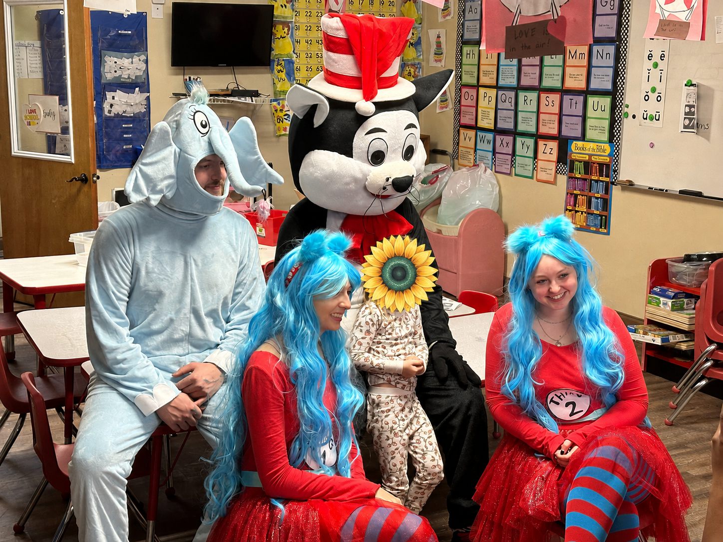 Bree's Legacy volunteers dressed as storybook characters during a school reading visit