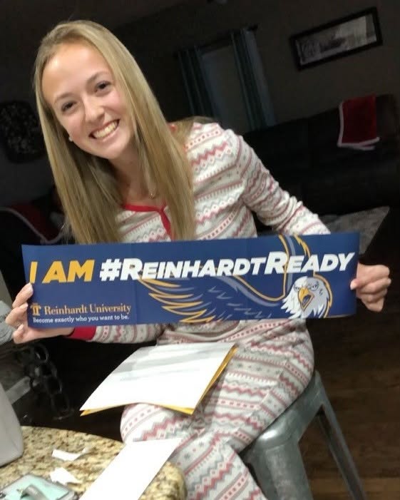 Bree holding her I AM #ReinhardtReady sign