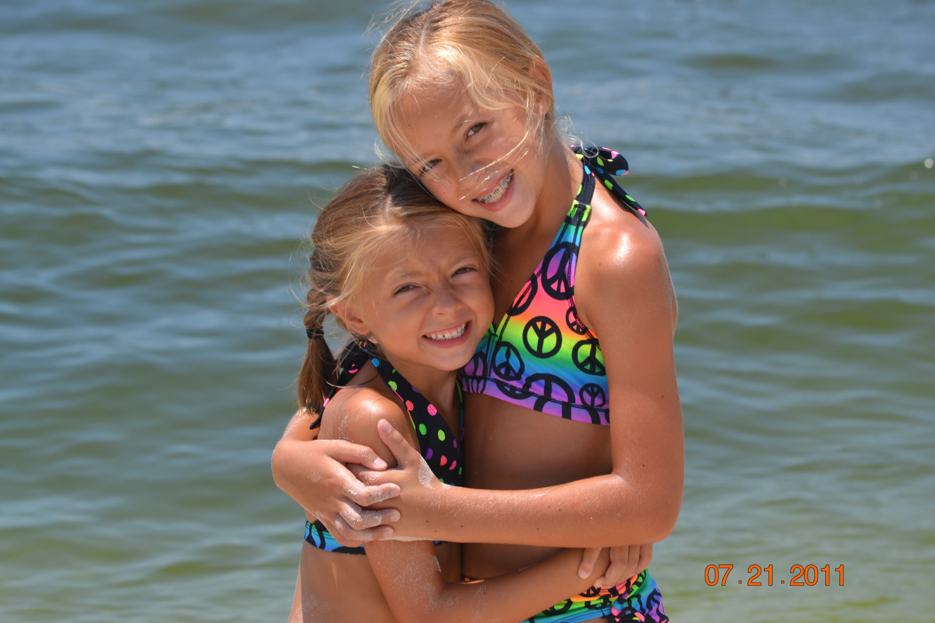 Bree and her sister Kirstin as children by the water