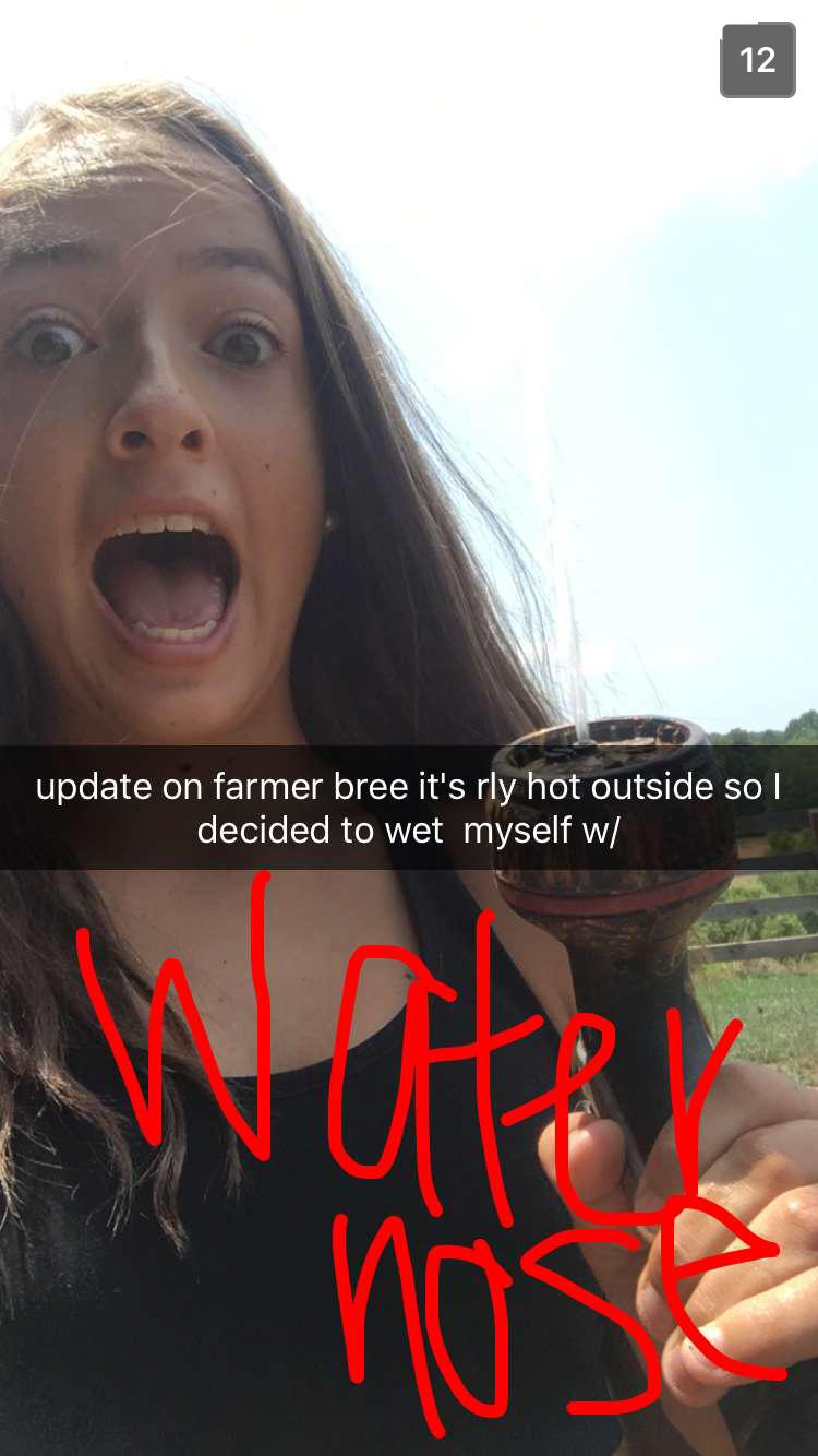 Farmer Bree snapshot: 'update on farmer bree it's rly hot outside so I decided to wet myself w/ water hose'